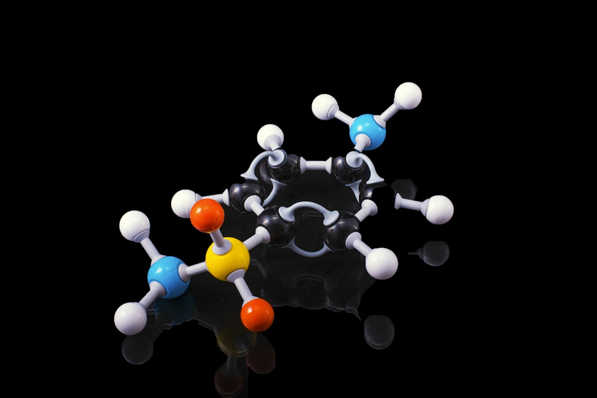 Ball-and-stick molecular model on a black background